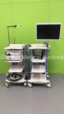 2 x Olympus Stack Trolleys Including Olympus OEV261H LCD Monitor,Olympus Evis Lucera CV-260SL Digital Processor,Olympus Evis MAJ-1154 Pigtail Connector,Olympus Evis Lucera CLV-260SL Light Source,Processor and Olympus Stack Connector Cables (Powers Up) * S