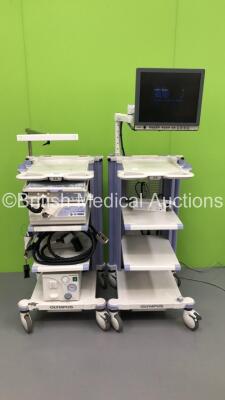 2 x Olympus Stack Trolleys Including Olympus OEV191H Monitor,Olympus Evis Lucera CV-260 Digital Processor,Olympus Evis Lucera MAJ-1154 Pigtail Connector,Olympus Evis Lucera CLV-260 Light Source,Processor,Olympus KV-5 Suction Unit and Olympus Connector Cab