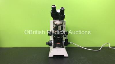 Olympus Model CH30RF200 Benchtop Microscope with 2 x Optics *1 x Olympus Plan N 20x/0.40 Ph1 Optic and 1 x Olympus 0.25 160/0.17 Optic* (Powers Up)