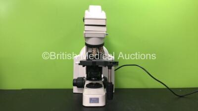 Nikon Model Eclipse E400 Benchtop Microscope with 2 x Optics *1 x Nikon Plan 100x 100x/1.25 0.17 WD 0.17 and 1 x Nikon Plan 10x 10x/0.25 WD10.5 Optic (Powers Up)