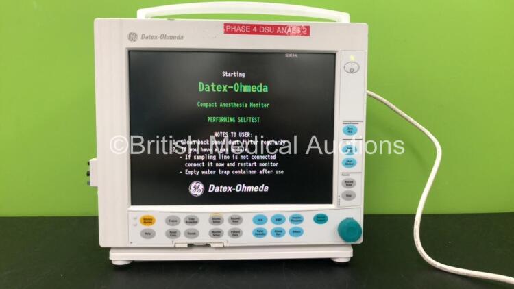 Datex Ohmeda Compact Anesthesia Monitor with 1 x GE E-CAiOV Spirometry Module Including Spirometry and D-fend Water Trap Options, 1 x GE E-PRESTN-00 Module Including ECG, SpO2, T1, T2, P1 and P2 Options (Powers Up)