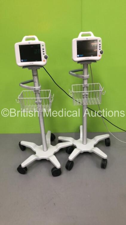 2 x GE Dash 3000 Patient Monitors on Stands with SpO2,Temp/CO,NBP and ECG Options (Both Power Up) * Mfd 2013 x 2 *