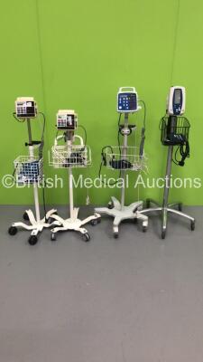 2 x CSI Criticare 506DXN Vital Signs Monitors on Stands, 1 x CSI Criticare 506NT3 Series Vital Signs Monitor on Stand and 1 x Welch Allyn SPOT Vital Signs Monitor on Stand (All Power Up) *S/N 10623738*