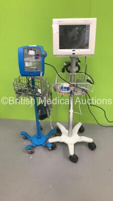 1 x GE Dinamap Pro 300 Vital Signs Monitor on Stand with Cables and 1 x Spacelabs Ultraview SL Patient Monitor on Stand with 2 x Modules and Cables (Both Power Up) *S/N 1370-200722*
