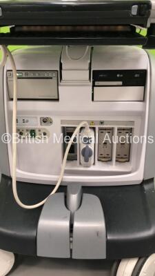 GE Vivid E9 Flat Screen Ultrasound Scanner *S/N VE96028* **Mfd 09/2013** Application Software Version 112 Revision 1.7 System Software Version 104.3.6 with 1 x Transducer / Probe (M5S-D Ref GE-3MIX *Mfd 09/2015*) and Sony UP-D897 Digital Graphic Printer ( - 13