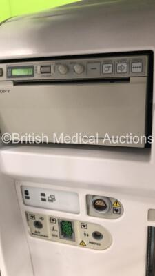 GE Vivid E9 Flat Screen Ultrasound Scanner *S/N VE96028* **Mfd 09/2013** Application Software Version 112 Revision 1.7 System Software Version 104.3.6 with 1 x Transducer / Probe (M5S-D Ref GE-3MIX *Mfd 09/2015*) and Sony UP-D897 Digital Graphic Printer ( - 14