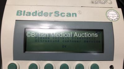 Mixed Lot Including 2 x Cardinal Health Alaris PK Syringe Pumps (Both Draw Power) and 1 x BladderScan BVI 3000 with Probe, 2 x Batteries and Charger (Powers Up) *02021499 - 800511889 - 800505215 - 4