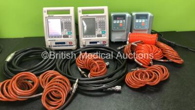 Mixed Lot Including 1 x Baxter Colleague CXE Infusion Pump (Powers Up) 1 x Baxter Colleague Infusion Pump (No Power) 2 x IVAC Model 598 Volumetric Pumps (Both Power Up, 1 with Error-See Photo) 10 x Assorted Air Hoses