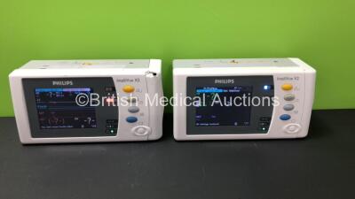 2 x Philips IntelliVue X2 Handheld Patient Monitors *Mfd 2014 - 2014* Including ECG, SpO2, NBP, Temp, and Press Options Software Revision J.10.52 and 2 x Batteries - Flat with Some Casing Damage - See Photo (Power Up when Tested with Stock Battery)