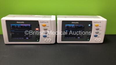 2 x Philips IntelliVue X2 Handheld Patient Monitors *Mfd 2010 - 2010* Including ECG, SpO2, NBP, Temp, and Press Options Software Revision H.15.41 with Some Casing Damage - See Photo (Power Up when Tested with Stock Battery-Batteries Not Included)