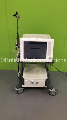 Drager Evita XL Ventilator Ref 8414900-05 Software Version 07.04 / Running Hours - 70750 with Hoses on Drager Mova Cart (Powers Up-Damage to Front Casing-See Photos) * SN ARSM-0376 * * Mfd 2002 *