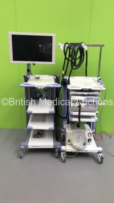 2 x Olympus Stack Trolleys Including Sony LCD Monitor,Olympus Evis Lucera CV-260 Processor,Olympus Evis Lucera CLV-260 Processor/Light Source,Olympus Evis Lucera MAJ-1154 Pigtail Connector and Olympus KV-4 Suction Unit (Powers Up-Missing 1 x Back Panel) *