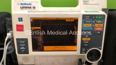 2 x Medtronic Lifepak 12 Biphasic Defibrillators / Monitors Including ECG, SPO2, CO2, NIBP and Printer Options with 2 x SpO2 Finger Sensors, 2 x 4 Lead ECG Leads, 2 x NIBP Hoses with BP Cuffs and 4 x Batteries in Carry Cases (Both Power Up) *SN 37628567, - 2