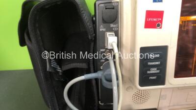 2 x Medtronic Lifepak 12 Biphasic Defibrillators / Monitors Including ECG, SPO2, CO2, NIBP and Printer Options with 2 x SpO2 Finger Sensors, 2 x 4 Lead ECG Leads, 2 x NIBP Hoses with BP Cuffs and 4 x Batteries in Carry Cases (Both Power Up) *SN 37628567, - 3