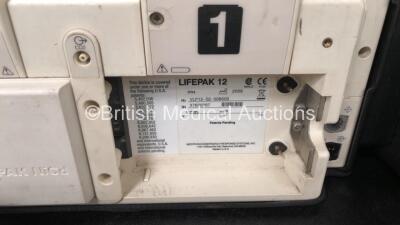 2 x Medtronic Lifepak 12 Biphasic Defibrillators / Monitors Including ECG, SPO2, CO2, NIBP and Printer Options with 2 x SpO2 Finger Sensors, 2 x 4 Lead ECG Leads, 2 x NIBP Hoses with BP Cuffs and 4 x Batteries in Carry Cases (Both Power Up) *SN 37628567, - 11