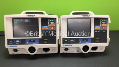 2 x Medtronic Physio Control Lifepak 20 Defibrillator / Monitors with ECG and Printer Options (Both Power Up) *GL* **32920862 - 32920854**