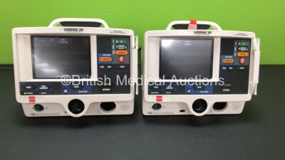 2 x Medtronic Physio Control Lifepak 20 Defibrillator / Monitors with ECG and Printer Options (Both Power Up) *GL* **33640499 - 32914944**