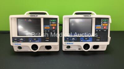 2 x Medtronic Physio Control Lifepak 20 Defibrillator / Monitors with ECG and Printer Options (Both Power Up with 1 x Service Light) *GL* **32915363 - 33640490**