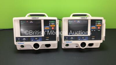 2 x Medtronic Physio Control Lifepak 20 Defibrillator / Monitors with ECG and Printer Options (Both Power Up) *GL* **33979493 - 33640483**