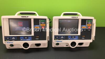 2 x Medtronic Physio Control Lifepak 20 Defibrillator / Monitors with ECG and Printer Options (Both Power Up) *GL* **32910899 - 32910898**
