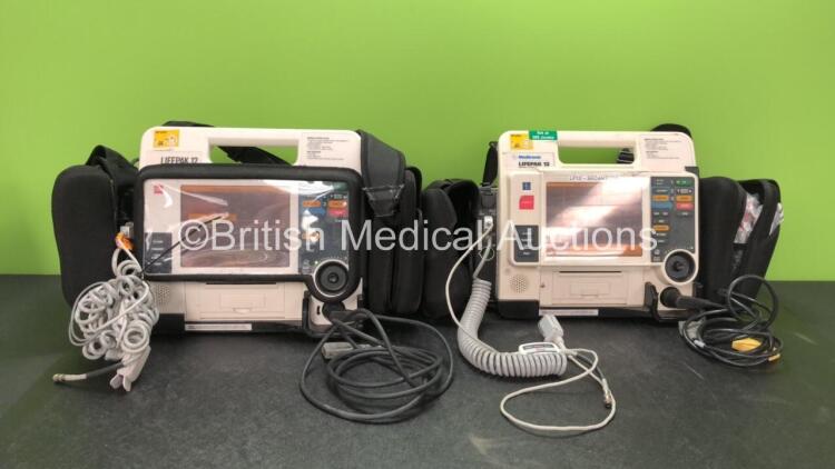 2 x Medtronic Lifepak 12 Biphasic Defibrillators / Monitors Including ECG, SPO2, CO2, NIBP and Printer Options with 2 x SpO2 Finger Sensors, 2 x NIBP Hoses and 4 x Batteries in Carry Cases (Both Power Up) *SN 37807823, 37808485*
