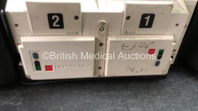 2 x Medtronic Lifepak 12 Biphasic Defibrillators / Monitors Including ECG, SPO2, CO2, NIBP and Printer Options with 1 x Defibrillator Electrode, 1 x SpO2 Finger Sensors, 1 x NIBP Hoses, 1 x BP Cuff and 4 x Batteries in Carry Cases (Both Power Up) *SN 3762 - 7