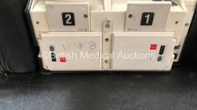 2 x Medtronic Lifepak 12 Biphasic Defibrillators / Monitors Including ECG, SPO2, CO2, NIBP and Printer Options with 1 x Defibrillator Electrode, 1 x SpO2 Finger Sensors, 1 x NIBP Hoses, 1 x BP Cuff and 4 x Batteries in Carry Cases (Both Power Up) *SN 3762 - 9