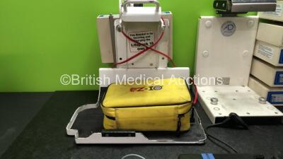 Mixed Lot Including 1 x DL007/33 Lifepak 15 Mounting Bracket with 1 x AD High Pak Charger, 1 x AD Back Pak 12 Mounting Lifepak 12 Mounting Bracket 6 x AD High Pak Chargers, 3 x Multitech MTCDP-H5 Batteries and 2 x Physio Control 6 Lead ECG Leads *1844794 - 2