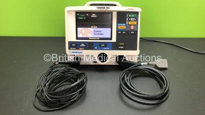 Medtronic Lifepak 20e Defibrillator with ECG and Printer Options with Paddle Lead and 3 Lead ECG Lead *Mfd 2010* (Powers Up with Service Light)