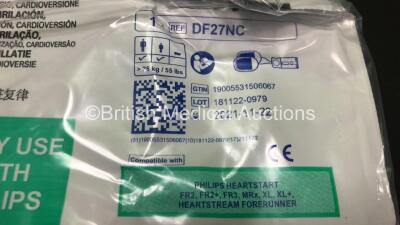 Job Lot Including 1 x Philips FR2+ Defibrillator, 1 x Laerdal FR2 Defibrillator with 4 x Batteries *Install Before 11-2020 - 04-2021 - 05-2020 - 11-2020* and Carry Cases (Both Power Up and Pass Self Test) and 1 x Lifepak AED Trainer with Controller in Car - 6