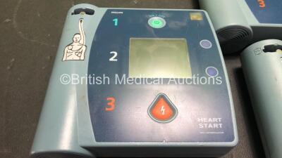 Job Lot Including 2 x Philips FR2+ Defibrillators (1 Powers Up with Error, 1 No Power-See Photo) 1 x Agilent FR2 Defibrillator (Powers Up) 3 x Philips M3863A Batteries *Install Dates 08-2012, 09-2017, 09-2012* - 3