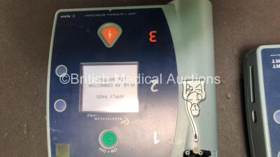 Job Lot Including 2 x Philips FR2+ Defibrillators (1 Powers Up with Error, 1 No Power-See Photo) 1 x Agilent FR2 Defibrillator (Powers Up) 3 x Philips M3863A Batteries *Install Dates 08-2012, 09-2017, 09-2012* - 4