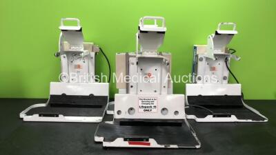 4 x Dlouhy DL007/33 Lifepak 15 Mounting Brackets with 3 x AD High Pak Chargers *SN 8851667, 8851657, 885167, 8851674*