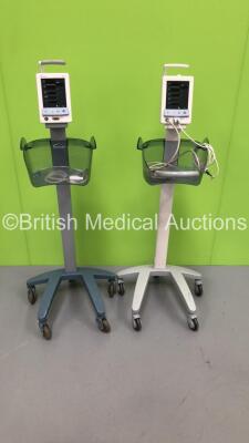 2 x Datascope Duo Patient Monitors on Stands with 1 x BP Hose and 1 x SpO2 Finger Sensor (Both Power Up) *H* * SN MD09604-A9 / MD17482-C3 *