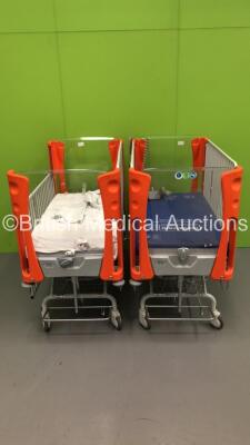 2 x Favero Health Embrace Plus Electric Infant Cots with Mattresses and Controllers (Both Draw Power-Unable to Test Due to Controller Locked) * SN 140052820006 / N/A *