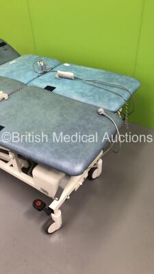 2 x Huntleigh Akron Electric Patient Examination Couches with Controllers (Both Power Up-Damage to Cushions-See Photos) * SN 64141 / 642142 * - 4