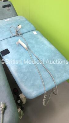 2 x Huntleigh Akron Electric Patient Examination Couches with Controllers (Both Power Up-Damage to Cushions-See Photos) * SN 64141 / 642142 * - 5