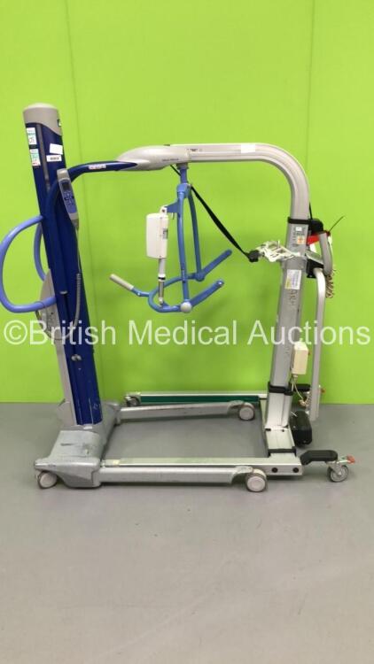 1 x Arjo Maxi Move Electric Patient Hoist with Controller and 1 x Liko Golvo 7007 ES Electric Patient Hoist with Controller (Unable to Test Due to No Batteries) * Equip No 072562 *