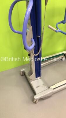 1 x Arjo Maxi Move Electric Patient Hoist with Controller and 1 x Liko Golvo 7007 ES Electric Patient Hoist with Controller (Unable to Test Due to No Batteries) * Equip No 072562 * - 3