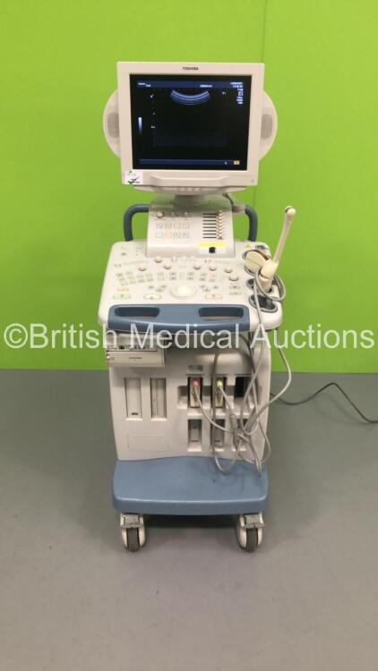 Toshiba Nemio XG Flat Screen Ultrasound Scanner Model SSA-580A with 2 x Transducers/Probes (1 x PVM-651VT * Mfd 2011 * and 1 x PVM-375AT * Mfd 2009 *) and Mitsubishi P93 Printer (Powers Up-See Photos for Air Scans-Marks to Side Panels-See Photos) * SN E3F