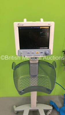 1 x Datascope Trio Patient Monitor on Stand (Powers Up - Damage to SPO2 Port) and 1 x GE Dinamap Procare Auscultatory 100 Vital Signs Monitor on Stand (No Power - Missing Face Cover) *S/N DPC120X-EN1* - 3