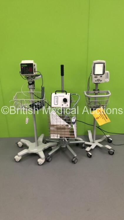 1 x Welch Allyn SPOT Vital Signs Monitor on Stand with BP Hose (Missing Front Face Panel), 1 x CSI Criticare Model 506DXN VItal Signs Monitor on Stand with BP Hose and Cuff and 1 x DuploSpray MIS Regulator on Stand with Hose (All Power Up)