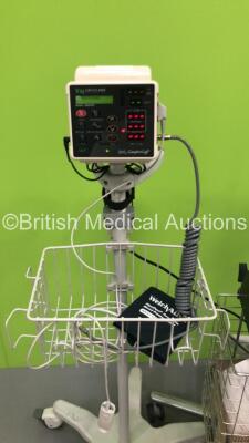 1 x Welch Allyn SPOT Vital Signs Monitor on Stand with BP Hose (Missing Front Face Panel), 1 x CSI Criticare Model 506DXN VItal Signs Monitor on Stand with BP Hose and Cuff and 1 x DuploSpray MIS Regulator on Stand with Hose (All Power Up) - 2