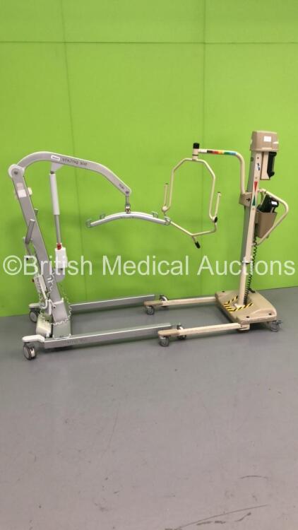 1 x Liko Viking 300 Electric Patient Hoist with Controller and 1 x Arjo Electric Patient Hoist with Controller (1 x No Power, 1 x Unable to Test Due to No Battery) * SN GB 0895 761378 008 / 800142 *