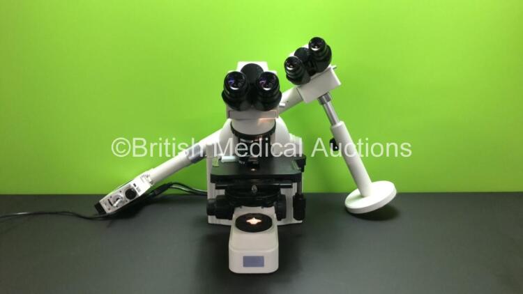 Nikon Eclipse E400 Benchtop Microscope with 1 x 100x/1.25 Oil Ph3 DL Infinity/0.17 WD 0.18 Optic, 1 x 40x/0.65 Ph2 DL Infinity/0.17 WD 0.65 Optic, CFi 10x/22 Eyepieces (1 x Cracked - See Photo) and Nikon Y-THS Teaching Aid (Powers Up with Good Bulb)