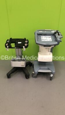 1 x SonoSite H-Universal Ultrasound Stand * Mfd 2013 * and 1 x GE Voluson Station with Printer * Missing Facia-See Photos * * Mfd 2011 *