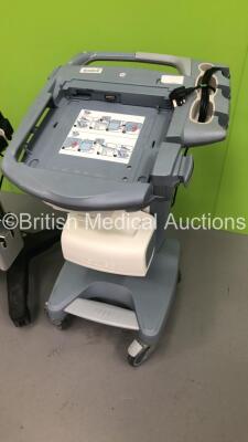 1 x SonoSite H-Universal Ultrasound Stand * Mfd 2013 * and 1 x GE Voluson Station with Printer * Missing Facia-See Photos * * Mfd 2011 * - 2