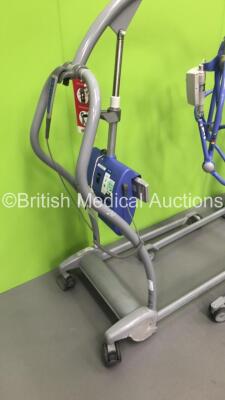 2 x Arjo Maxi-Twin Electric Patient Hoists with 1 x Battery and 2 x Controllers (Both No Power) - 3