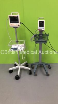 1 x Datascope Duo Patient Monitor on Stand with 1 x BP Hose and 1 x Hewlett Packard Viridia M4 Patient Monitor on Stand with 1 x M3000A Module with ECG/Resp,SpO2,NBP,Press/Temp Options and 1 x BP Hose (Both Power Up) * SN DE85014708 / MD04501-L6 *