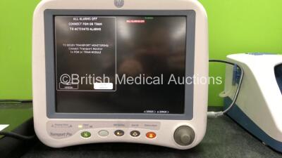 Mixed Lot Including 1 x GE Transport Pro Patient Monitor with 1 x AC Power Supply (Powers Up with Damaged Power Port-See Photo) 1 x Fisher & Paykel Ref PT101UK Airvo 2 Humidifier Unit (Powers Up with Blank Display and Alarm) 1 x enLow Controller Model 121 - 2